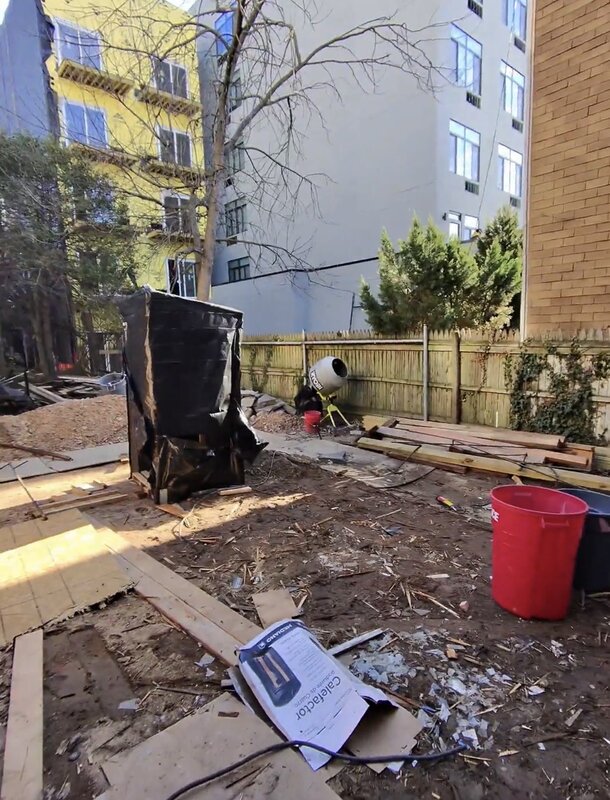 Yard cleared with equipment after debris removal